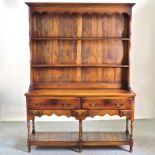 An 18th century style oak dresser,