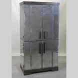 A Rupert Bevan Ltd Art Deco inspired cocktail cabinet, enclosed by two pairs of mirrored doors,