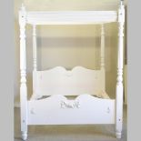 A Laura Ashley white painted four poster bedstead,