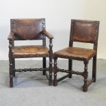 A set of six early 20th century brown leather upholstered and studded dining chairs,