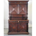 A 19th century continental oak cabinet, enclosed by panelled doors,