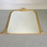 A large gilt frame over mantel mirror,