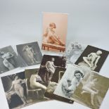 A collection of eleven early 20th century French erotic postcards,