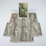 A collection of nine early 20th century French erotic postcards,