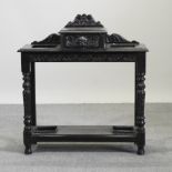 A 19th century carved oak hallstand,