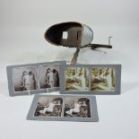 An early 20th century stereoscopic viewer, together with three French slides,
