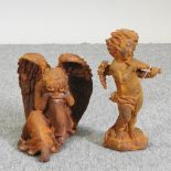 An angel playing a violin, 29cm high,