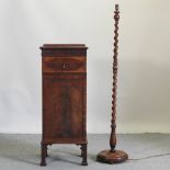 A 1920's mahogany narrow side cabinet, 47cm, together with a standard lamp,