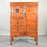 A Chinese elm wedding cabinet,