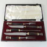 A Victorian steel and antler carving set,