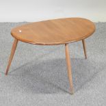 An Ercol light elm occasional table,