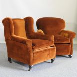 A 1920's brown upholstered armchair,