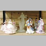 A collection of porcelain figures, to include Royal Doulton,