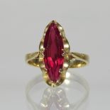 An 18 carat gold and ruby ring, of elliptical design,