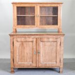 An early 20th century continental side cabinet, with a later top,