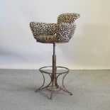 A leopard print upholstered bar stool