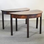 A pair of George III mahogany D-shaped side tables, on square legs,