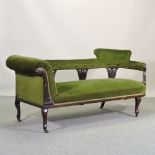 An Edwardian green upholstered chaise longue,