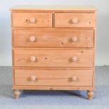 An antique style white painted chest of drawers,