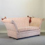 A peach floral upholstered knole sofa,