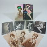 A collection of nine various early 20th century French erotic postcards,