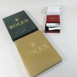 George Gordon, Rolex, first edition book, together with a Cartier watch cleaning set,