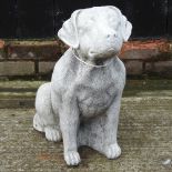A reconstituted stone garden model of a dog,