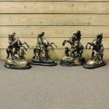 A collection of four models of Marley horses,