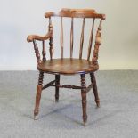 A Victorian smoker's bow chair