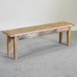 A rustic pine bench,