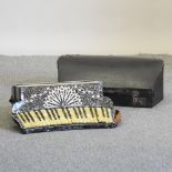 A piano accordion, by Donzelli, in a hard case,