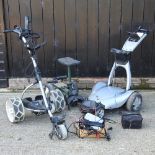 A collection of golf caddies and carts