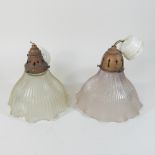 A near pair of mid 20th century Holophane type glass light shades,