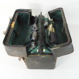 An early 20th century leather travelling vanity case,
