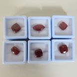 A collection of six unmounted natural ruby gemstones,