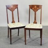 A pair of Art Nouveau mahogany and inlaid side chairs,