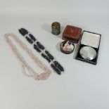 A collection of costume jewellery, together with compacts and advertising tins,