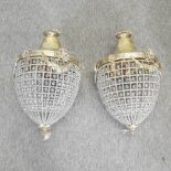 A pair of brass and glass pineapple shaped chandeliers,