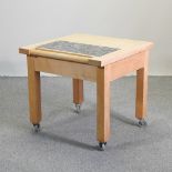 A beech butcher's block, with an inset granite section,