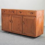 An Ercol light elm sideboard,