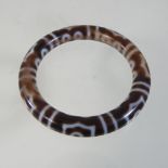 A Tibetan style agate bangle