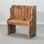 A hand made rustic pine pew,