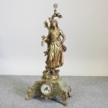 A 19th century French gilt spelter figural mantel clock, on a green marble base, inscribed Mignon,