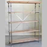 A metal framed baker's rack,