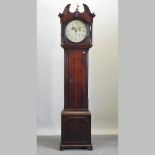 A George III oak cased longcase clock, having a painted circular dial and thirty hour movement,