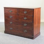 A George III mahogany and inlaid chest of drawers,