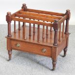 An Edwardian mahogany four division canterbury,