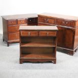 A Stag chest of drawers, together with a reproduction cabinet and a bookcase,