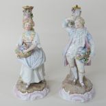 A pair of continental porcelain figures,
