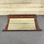 An early 20th century mahogany and inlaid over mantel mirror,